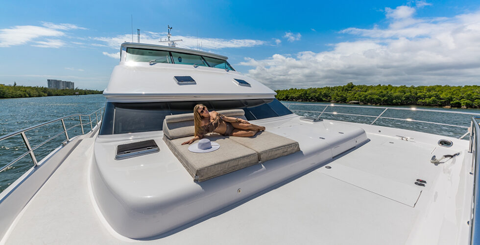 A woman posing on a yacht