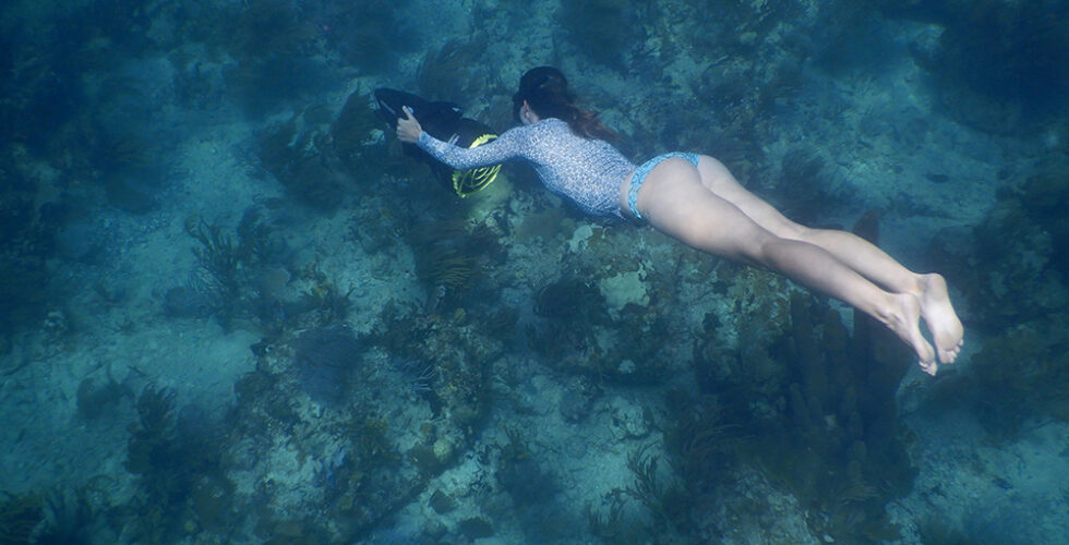 A woman scuba diving