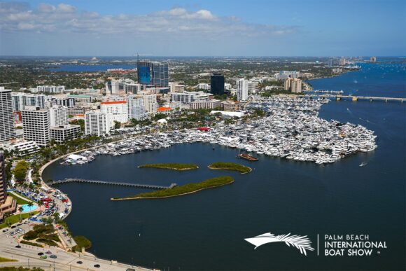 Aerial view of the Palm Beach International Boat Show with numerous boats, yachts, and superyacht ready certification docked along the waterfront.