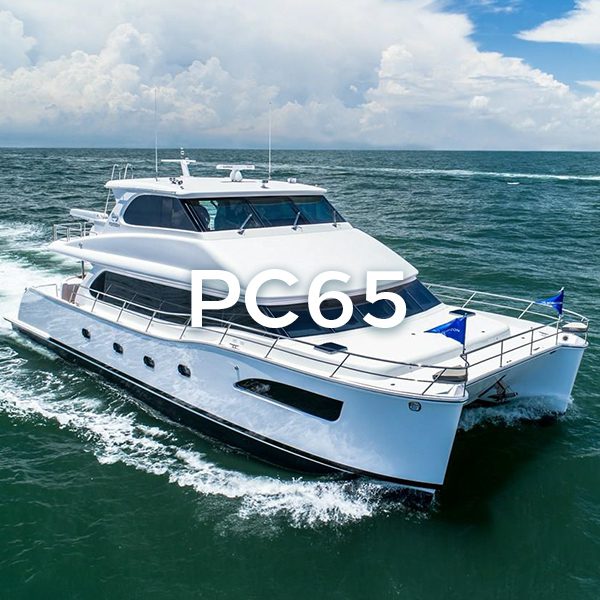 White power catamaran PC65 on water.