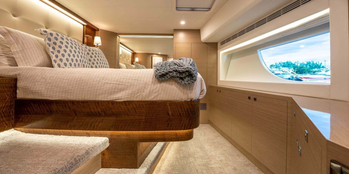 Luxury yacht stateroom with ocean view.