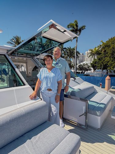 Happy couple on their new boat.